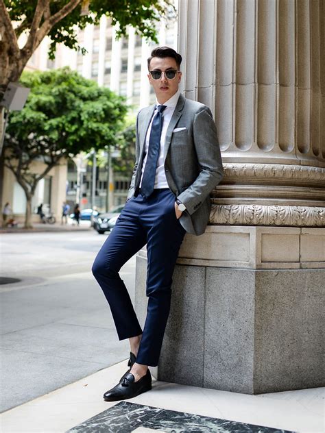 navy pants with grey blazer.